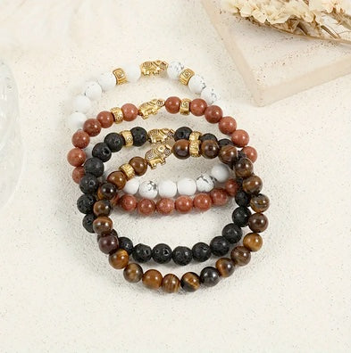 Set Of Four Handmade Beaded Bracelet Set with Gold-Tone Elephant